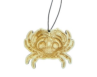 May include: A wooden crab ornament with a detailed design, perfect for hanging on a Christmas tree or adding a nautical touch to your home decor.
