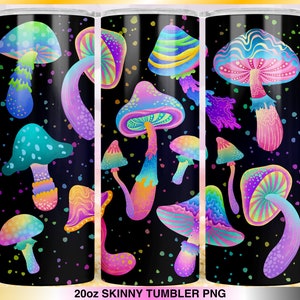 May include: A 20oz skinny tumbler with a vibrant, psychedelic mushroom design. The tumbler features colorful mushrooms in shades of blue, pink, yellow, and green against a black background with colorful speckles. The text "20oz SKINNY TUMBLER PNG" is at the bottom.