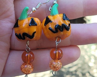 Orange pumpkin glass beaded dangle earrings, spooky Halloween statement jewelry, alternative fashion accessory, horror gift ideas for her