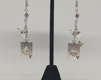 Husker Hazbin Hotel inspired dangle earrings, fandom statement jewelry, alternative fashion accessory, quirky gifts, spring trends