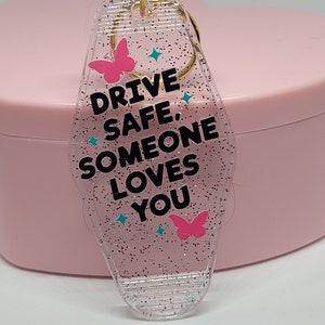 Acrylic Drive Safe Someone Loves You Funny Parody Retro Motel Hotel Keychain