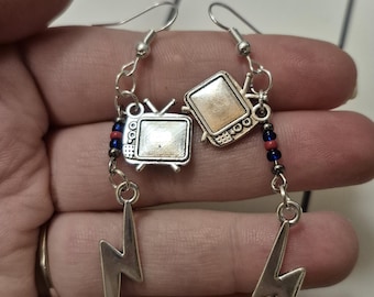 Vox Populi tv beaded dangle earrings, Hazbin Hotel inspired statement jewelry, geeky fashion accessory, whimsical stocking stuffer gifts