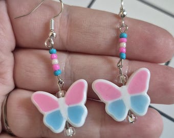 Trans pride butterfly beaded earrings, LGBTQIA themed statement jewelry, alternative insect fashion accessory, LGBTQ pride gift ideas