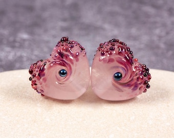 Handmade small glass heart bead pair - cranberry pink