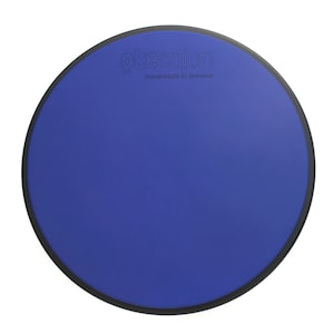 May include: A blue round cajon drum with a black rim and the text "okecajon handmade in Istanbul" printed on the surface.