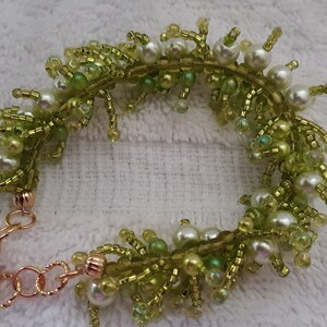 Bracelet- Pearls in a field of green- ladies beaded Cha cha bracelet- fully adjustable