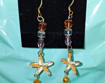Earrings, colorful starfish. Summer jewelry. Ocean vacation or luau.