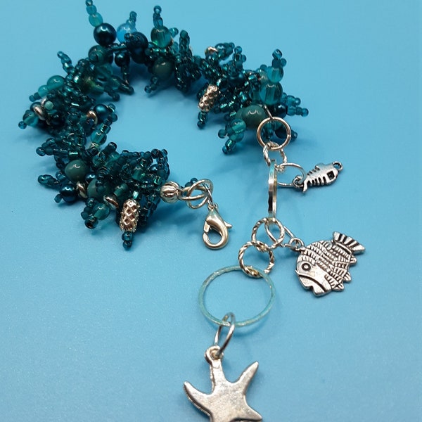 Ladies jewelry under 40,  dark turquoise Cha cha sometimes called fringe bracelet, multi size beads, with silver accents, 3 tropical charms