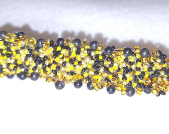 Barrette-Confetti, black and gold glass beads. 3 1/2 inches.