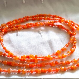 Necklace, bracelet, anklet- waist beads. Practical 38 inch long bads.