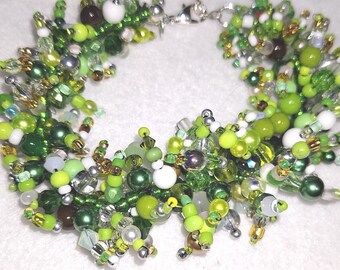 Ladies Cha-cha bracelet. shades of green, gold and white- vibrant jewelry for her.