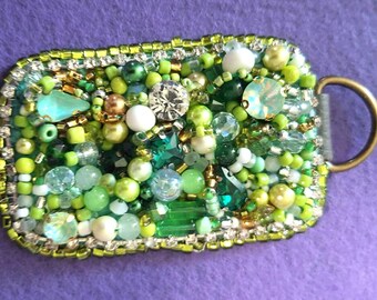 Keychain. Lime green rectangular- suitable as a purse charm, or backpack charm.
