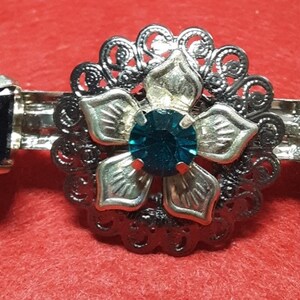 Hair barrettes- gunmetal and silver with dark teal crystal rhinestones. 2 1/4 inch single barrette for thick hair.