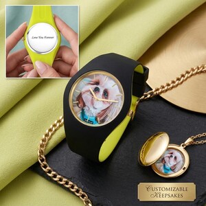 May include: A black and yellow watch with a photo of a dog on the face, and a gold chain necklace with a matching locket. The watch face has gold hands and a gold rim. The locket is open, revealing a photo of the same dog. The watch in the inset says "Love You Forever".