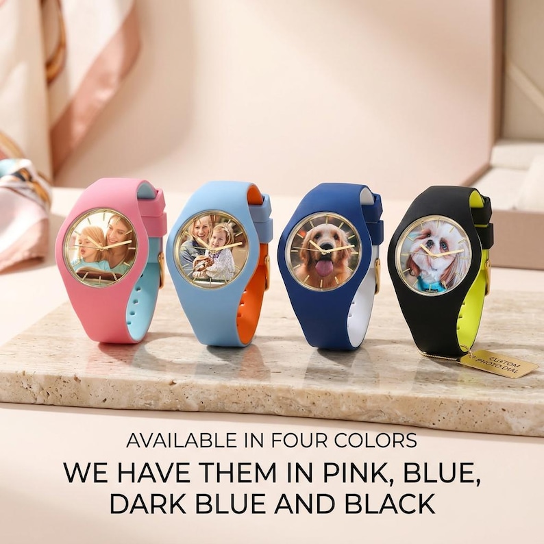 May include: Four colorful watches with custom photo dials. The watches are pink, light blue, dark blue, and black. Each watch has a different photo on the face. The watch bands are a contrasting color. The text on the image says "AVAILABLE IN FOUR COLORS WE HAVE THEM IN PINK, BLUE, DARK BLUE AND BLACK."