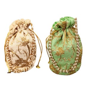 May include: Two drawstring pouches. One is beige with gold floral embroidery and a pearl beaded trim. The other is light green with gold floral embroidery and a pearl beaded trim. Both have gold drawstrings and tassels.
