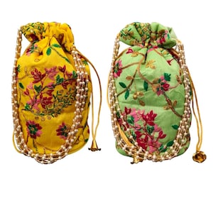 May include: Two embroidered drawstring pouches. One is yellow with red and pink floral designs, the other is light green with similar floral patterns. Both have pearl-beaded straps and gold accents.