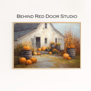 May include: A framed painting of a white farmhouse with a gray roof, surrounded by pumpkins and barrels. The painting has a warm color palette with orange, brown, and yellow hues. The text "BEHIND RED DOOR STUDIO" is at the top.