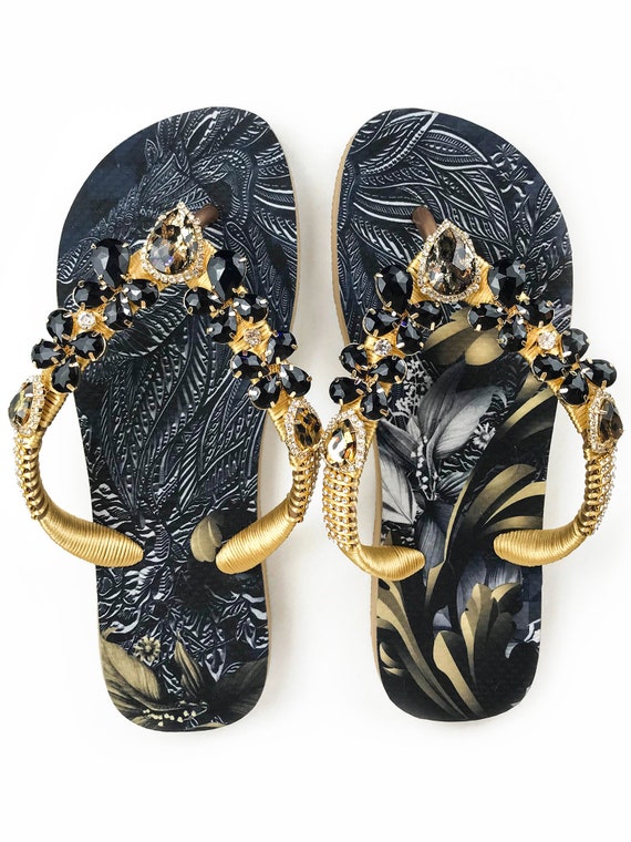 black and gold havaianas flip flops