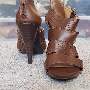 Size 8.5 brown criss cross sandal, BCBG