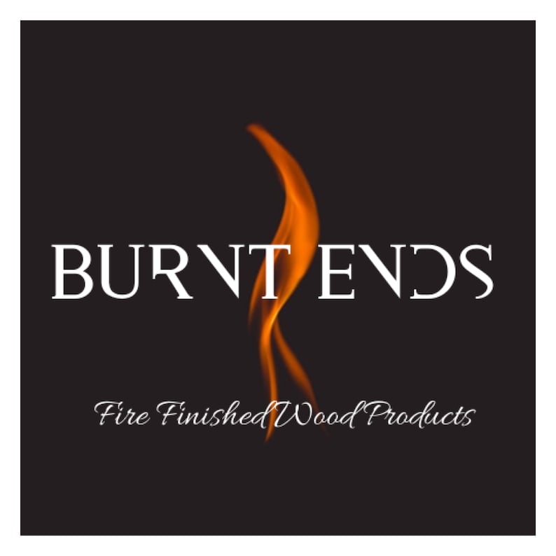 May include: A logo for a business called "Burnt Ends" that specializes in fire finished wood products. The logo features a stylized flame in orange and yellow.