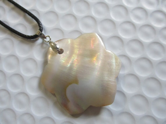 black cord necklace conch shell pendant