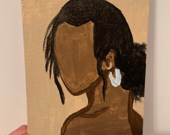 May include: A painting of a person with brown skin and black hair. The person is wearing a large white hoop earring. The painting is on a canvas with a beige background.