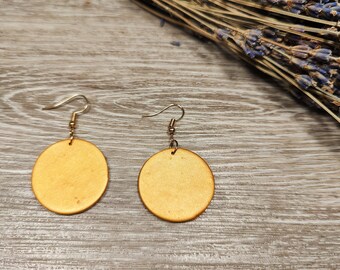 Gold Polymer Clay Earrings, Modern Chic Handmade Accessories, Gold color circle earrings, Unique women's accessories.