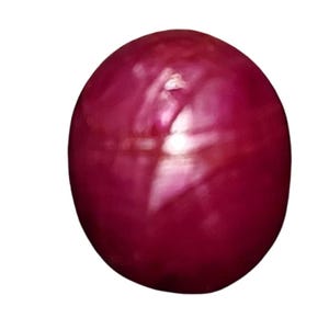 May include: A round, polished gemstone with a deep red hue. The surface reflects light, creating highlights and shadows. The gem appears smooth and lustrous, suggesting a high-quality finish. The overall shape is a perfect sphere.