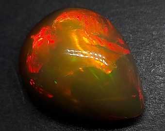 High grade black opal cabochon - natural welo gemstone 9.00 CTS - pear shape 9.00 CTS - October birthstone - Ethiopian fire opal