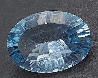 Natural blue Topaz Gemstone - Faceted Loose Topaz 6.05 CTS - oval shape 14 x 10 mm - laser cut Swiss blue - Canadian supplier
