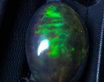 Gigantic opal gemstone - loose natural black opal cabochon 33.65 CTS - oval 31 x 23 mm - Ethiopian rainbow stone for jewelry making