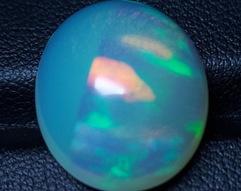 Large unique opal cabochon - loose natural white opal gemstone 11.55 CTS - oval 19 x 16 mm - rainbow stone for jewelry making