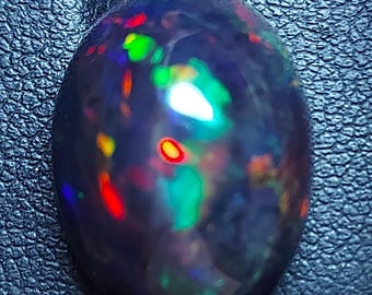 Large AAA black opal cabochon - natural Ethiopian Welo opal gemstone 12.70 CTS - oval 20 x 15 mm - loose rainbow stone for jewelry making