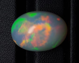 Giant untreated opal cabochon - natural white opal gemstone 19.20 CTS - oval 21 x 15 mm - loose Ethiopian rainbow stone for jewelry making