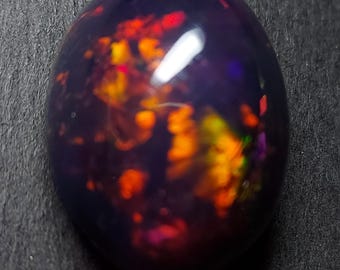 Huge firey black opal cabochon - natural Ethiopian Welo opal 26.35 CTS - oval 24 x 19 mm - loose opalecent stone for jewelry making