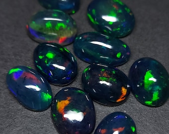 10 flashy black opal gemstones - loose natural welo Opal cabochon 30.80 CTS - oval 12 x 9 mm - wholesale Ethiopian stone for jewelry making