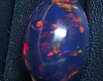 Huge Irridescent black opal gemstone - natural welo opal cabochon 20.10 CTS - oval 23 x 15 mm - loose Ethiopian rainbow stone for jewelry