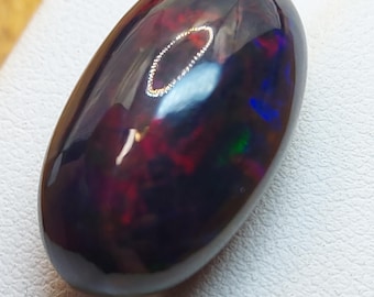Giant black opal cabochon - loose natural welo Opal cabochon 20.85 CTS - oval 24 x 13 mm - Ethiopian rainbow stone for jewelry making