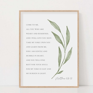 May include: A printable wall art design with a white background and a green leafy branch. The text reads "Come to me. All you who are weary and burdened. And I will give you rest. Take my yoke upon you and learn from me, for I am gentle and humble in heart, and you will find rest for your souls. For my yoke is easy and my burden is light. Matthew 11:28-30"