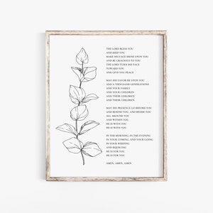 Op de afbeelding: Zwart-witte printbare kunstprint met een bloemmotief en een gedicht over zegen en vrede. Het gedicht luidt: "De Heer zegene u en bewaar u... Amen, Amen, Amen."