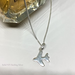 Silverworks airplane necklace top