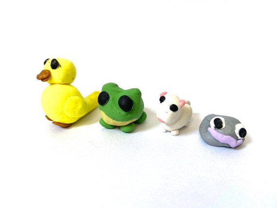 Roblox Adopt Me Chick Frog Snow Puma Pet Rock Figurines Etsy - raining duck duck roblox