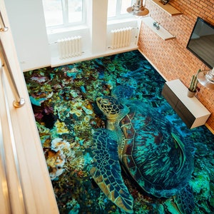 May include: A large, detailed floor covering featuring a realistic underwater scene with a sea turtle. The design incorporates shades of blue, green, and brown, creating a vibrant and immersive aquatic environment. The turtle is the focal point, surrounded by coral and other marine life.