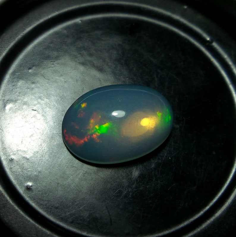 3.24 Carat 12.5x10.2x5.7 MM Natural Top Grade Green Red Yellow Rainbow Fire Ethiopian Opal Oval Shape Cabochon,Multi Fire Welo Opal Stone 3.24 Carat 12.5x10.2x5.7 MM Natural Top Grade Green Red Yellow Rainbow Fire Ethiopian Opal Oval Shape Cabochon,Multi Fire Welo Opal Stone