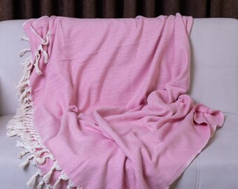 Manta individual con diseño de rombos, color rosa, 100% algodón