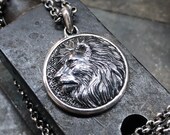 Mens silver lion pendant discount