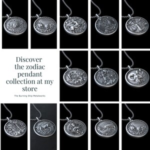 May include: A collection of 12 silver zodiac pendant necklaces. Each pendant features a different zodiac sign, including Aries, Taurus, Gemini, Cancer, Leo, Virgo, Libra, Scorpio, Sagittarius, Capricorn, Aquarius, and Pisces. The pendants are all round and have a detailed design.