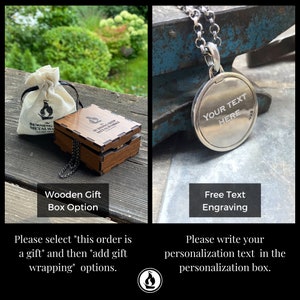 May include: A silver pendant necklace with a round disc charm that can be engraved with custom text. The pendant is displayed on a blue metal surface. The image also shows a wooden gift box with a small white bag. The text "Your Text Here" is engraved on the pendant.