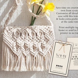 May include: A white crocheted bag with fringe hanging from the bottom. The bag is hanging from a hook on a white wall. A tag is attached to the bag with the text "VOUTH HANDMADE" and care instructions. The tag also includes the price of $58, the material (100% cotton), and the origin (United Kingdom).